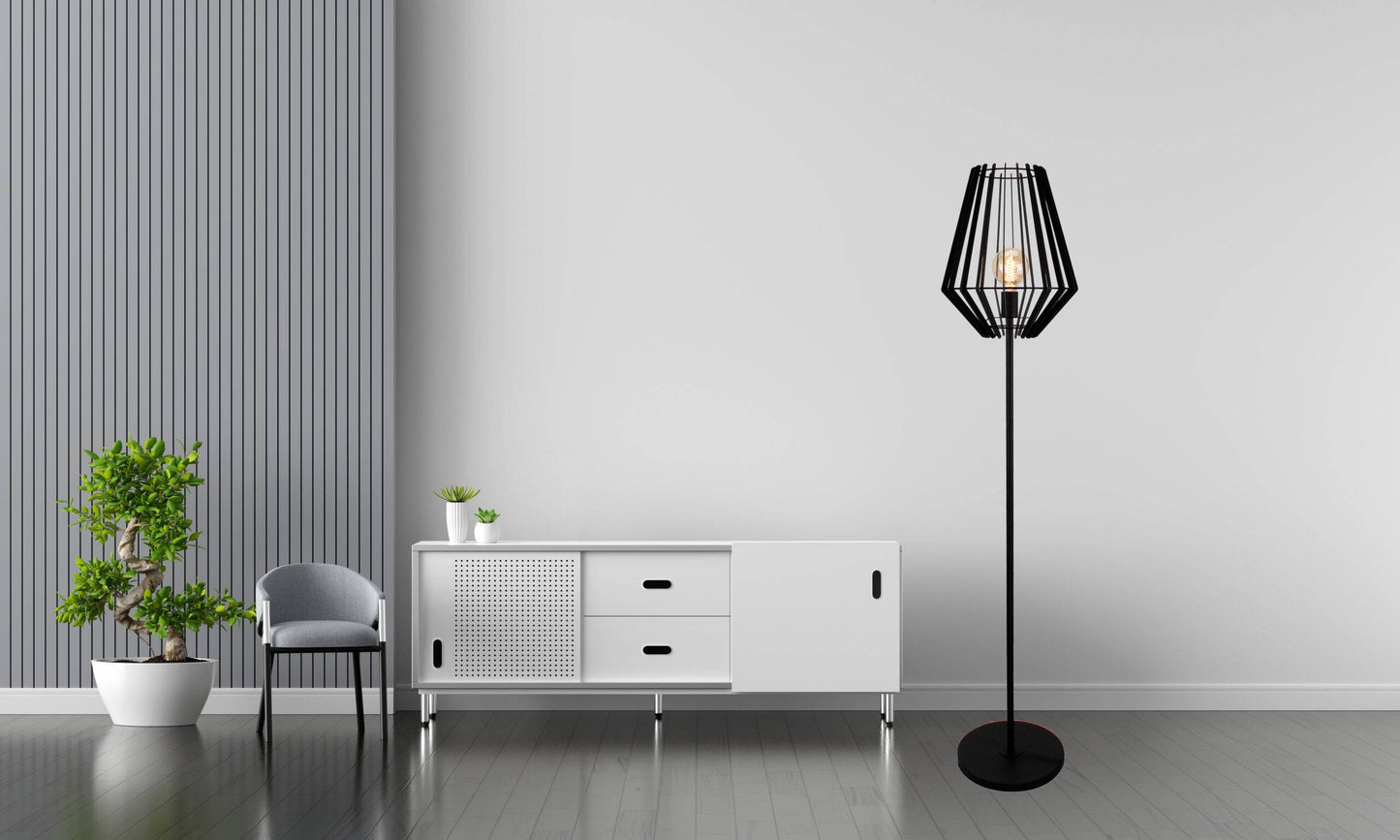 Een zwarte Chericoni Tavola vloerlamp met een ronde kap van Ø30 cm, geschikt voor één E27-lichtbron. Stijlvol en modern ontwerp.