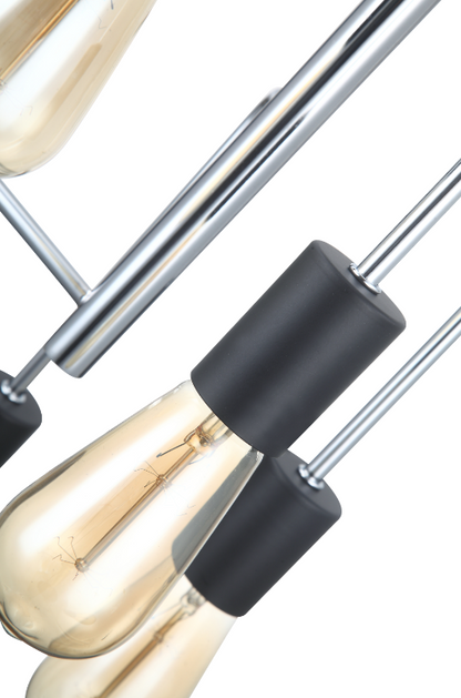 De Chericoni Retro Hanglamp met drie lichtpunten. De lamp heeft een combinatie van chromen en zwarte elementen en een retro design.
