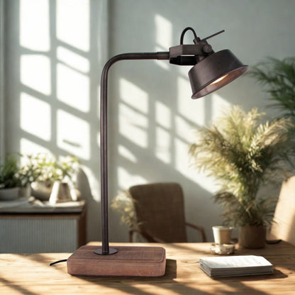 Various Max tafellamp Ø12 cm geplaatst op een nachtkastje of bijzettafel, die gericht licht en sfeer verspreidt.