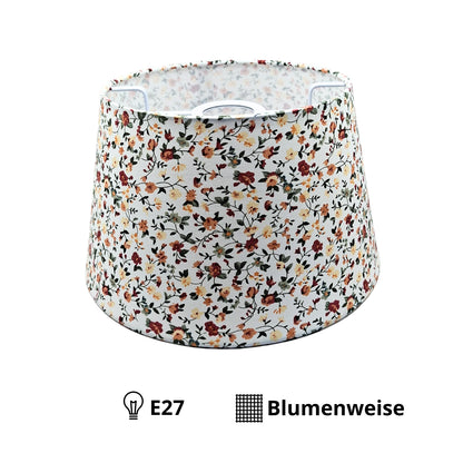 This cream floral lampshade adds a vintage touch to any room. Perfect for creating a warm, bohemian atmosphere.