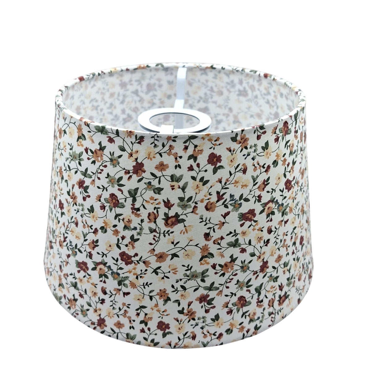 Charming cream lampshade adorned with floral patterns. Perfect for adding a vintage bohemian touch to your decor.