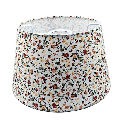 Embrace vintage charm with this cream floral lampshade. Perfectly complements bohemian and country-style interiors.