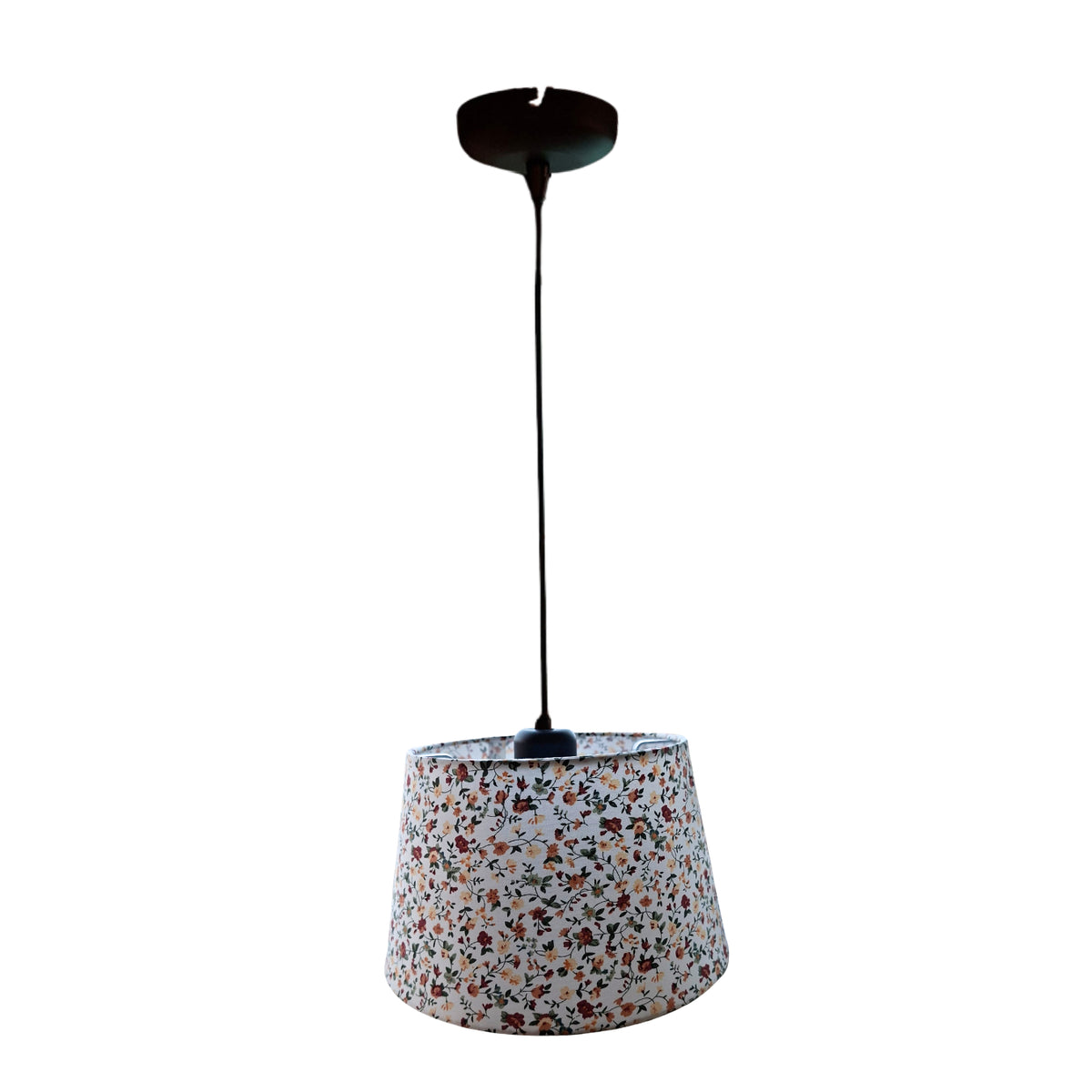 A cream chintz lampshade adorned with floral patterns. Perfect for adding a vintage bohemian touch to your home decor.