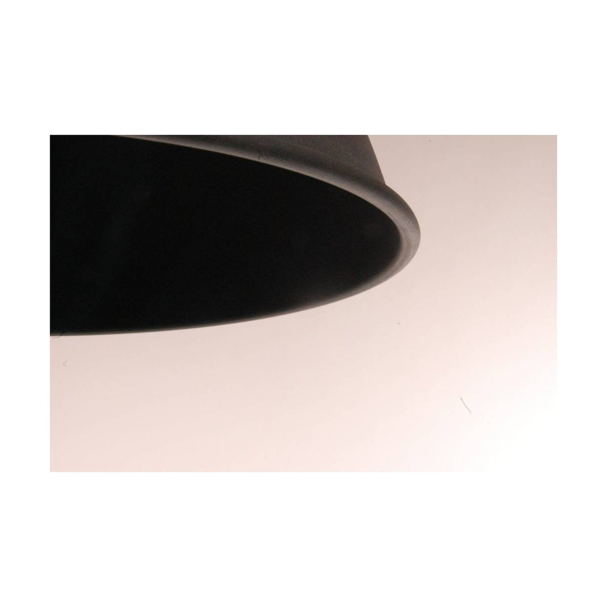 A close-up of the modern grey Cucina pendant lamp showcasing its sleek design.