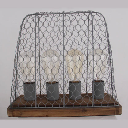 De Quattro tafellamp in beton en vintage hout brengt een warme, industriële sfeer in jouw interieur. Een echte eyecatcher!