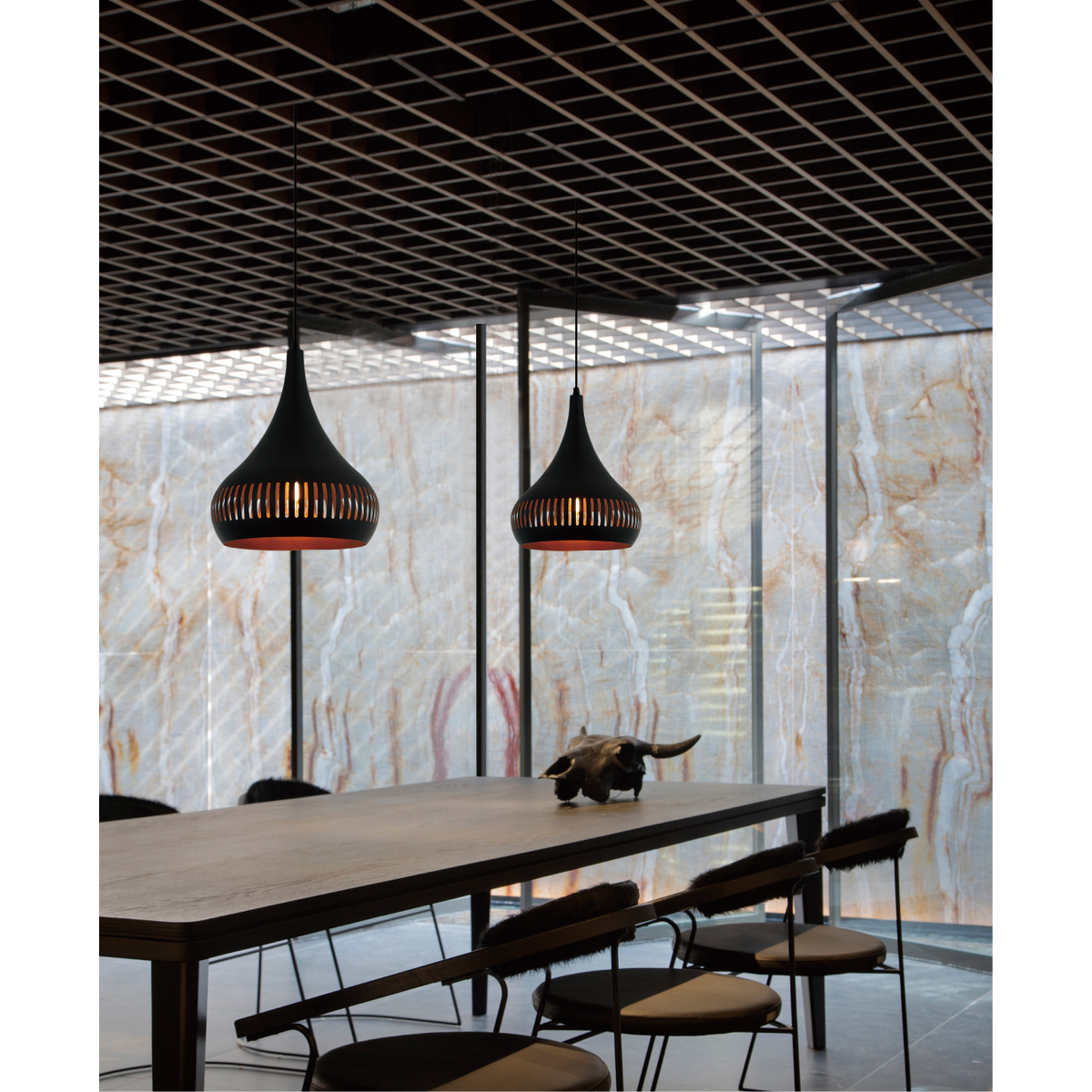 Illuminate your space with the bold Strisce pendant light in black. Perfect for adding an industrial touch to any room.