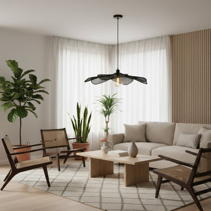 A stunning close-up of the black Corvo pendant light. Its sleek design adds a modern touch to any interior space.