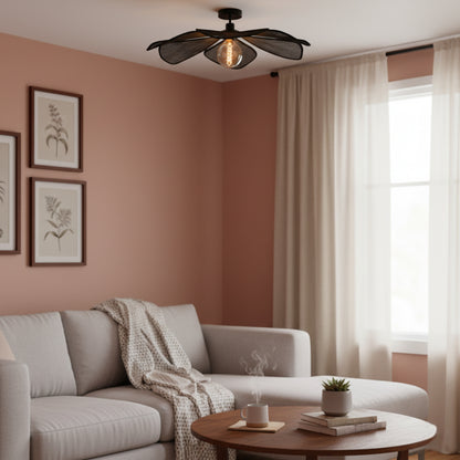 Illuminate your space with the striking black Corvo ceiling light. Its bold design sets a dramatic mood in any room.