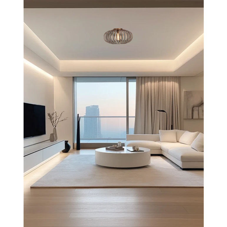 De bronzen Curvato plafondlamp geeft een industriële flair aan je interieur.