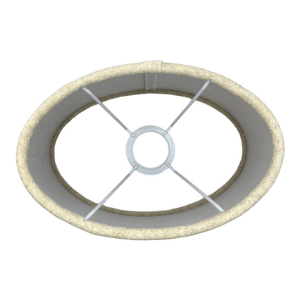 This beige oval lampshade adds a modern touch to any room. Perfect for diffusing warm light and enhancing your decor.