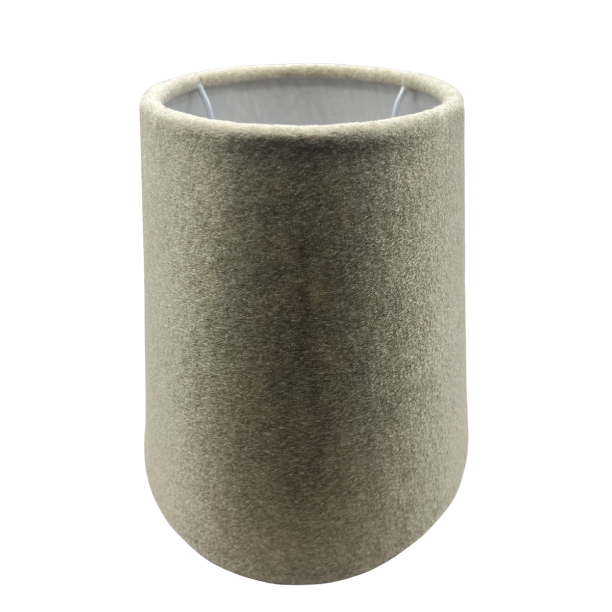 A beautiful side view of the modern beige lampshade. It adds a warm, inviting glow to any interior space.