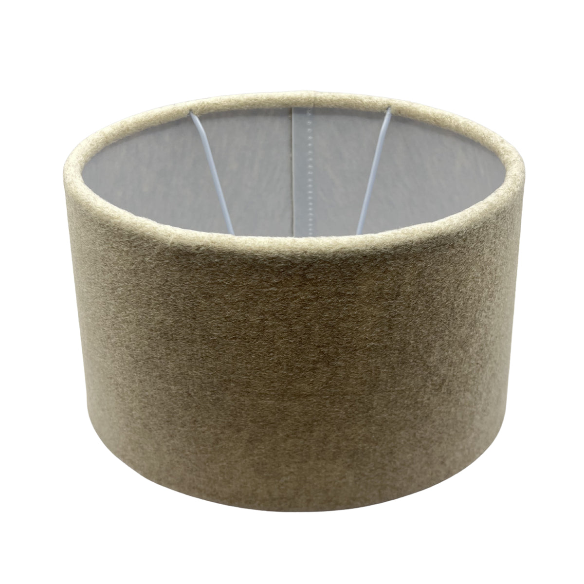A top view of the oval beige lampshade exudes a modern charm. Perfect for adding warmth and style to any room.