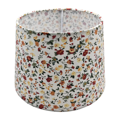 A timeless cream lampshade with a sleek drum shape. Perfectly complements any décor while softening ambient light.