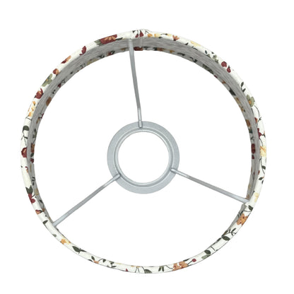 A top view reveals the timeless design of this cream lampshade. Perfect for adding an elegant touch to any light fixture.