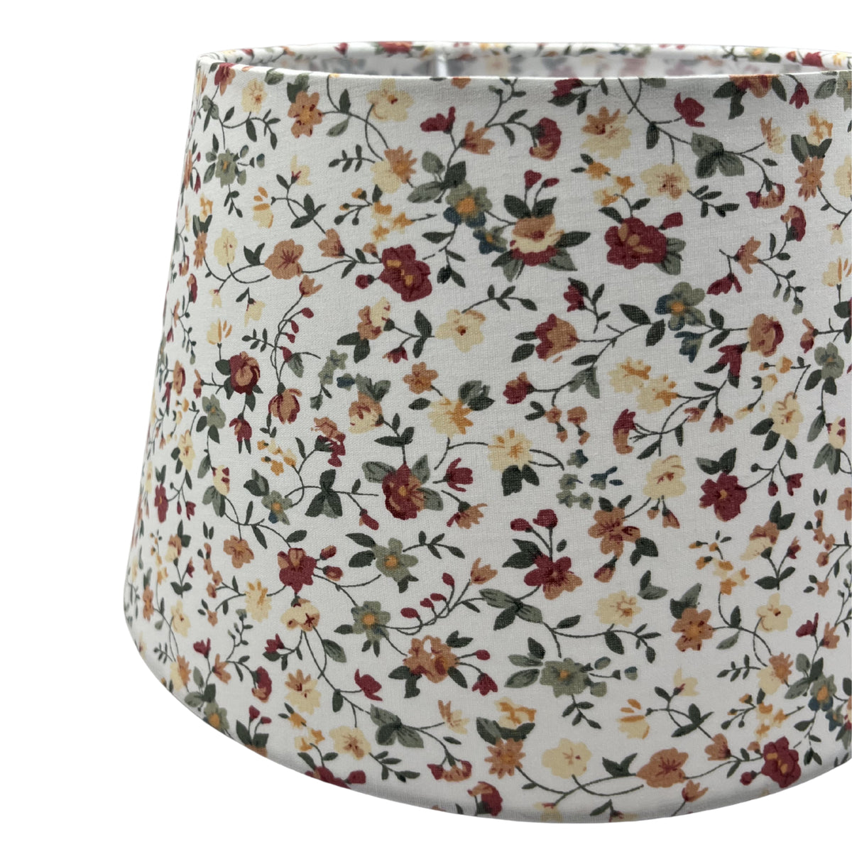 Charming cream lampshade with a timeless design. Perfect for adding a warm glow to any room.