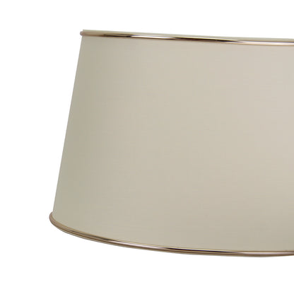 Fijne detailfoto van de ovale crèmekleurige lampenkap met gouden afwerking. Perfect voor een elegante uitstraling in huis.