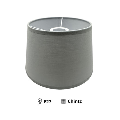 Deze grijze lampenkap in drumvorm voegt een moderne touch toe aan je interieur. Perfect voor sfeervolle verlichting.