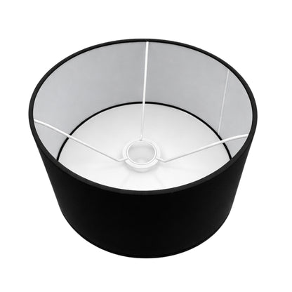 Deze zwarte lampenkap in drumvorm voegt een moderne touch toe aan je interieur. Perfect voor sfeervolle verlichting.