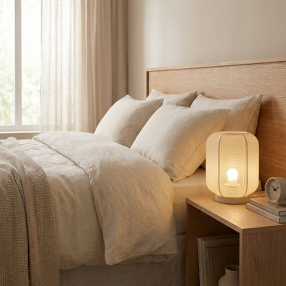 Illuminate your space with the soft glow of this cream Lecce table lamp. A perfect blend of Japandi style and functionality.