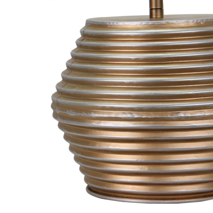 A close-up of the Modena table lamp highlights its elegant cream and gold finish.