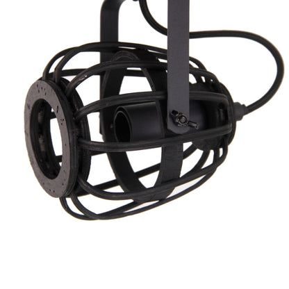 A close-up of the black Nature Trapeze ceiling light showcases its rustic charm. Perfect for adding a touch of elegance to