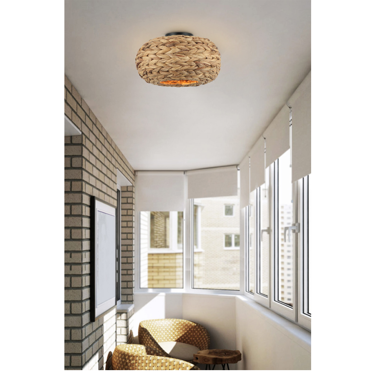 Close-up of the Nature Treccia ceiling light in warm brown.