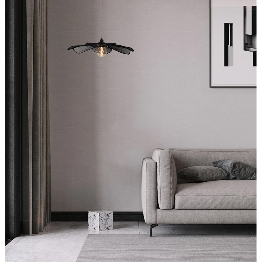 Een detail van de Corvo hanglamp in zwart. Deze bohemian lamp voegt een unieke flair toe aan jouw interieur.