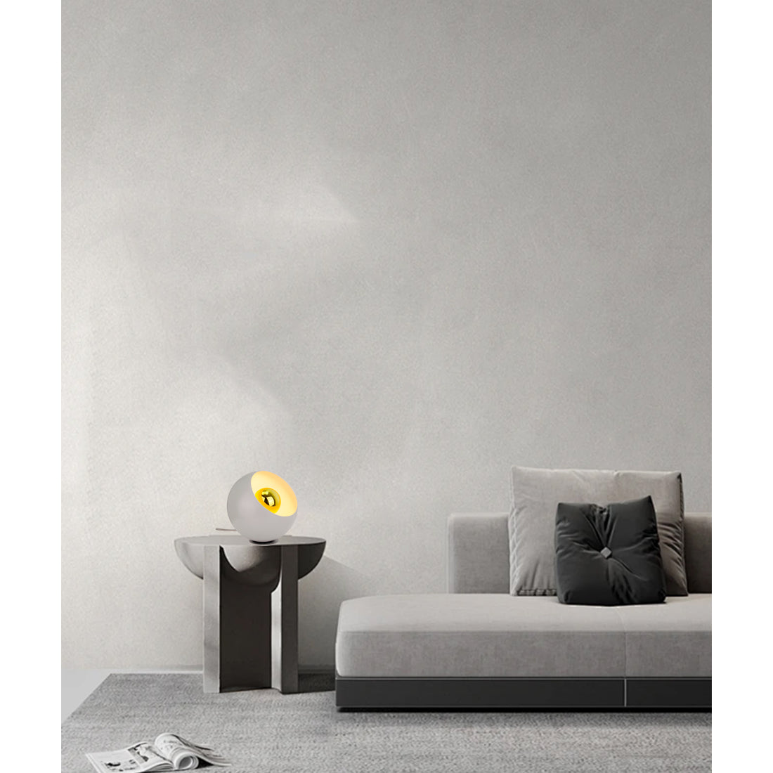 Een grijze tafellamp uit de Occhio-serie geeft een warme, elegante sfeer. Perfect voor sfeervolle avonden thuis.
