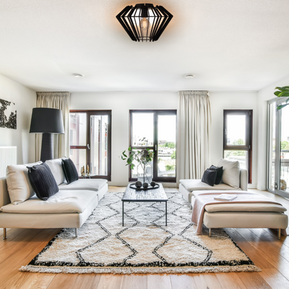 De zwarte Tavola plafondlamp straalt moderne elegantie uit. Perfect voor een sfeervolle toevoeging aan je interieur.