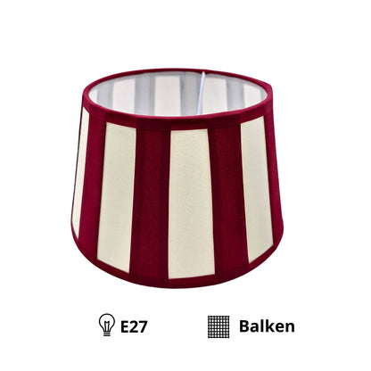 Deze lampenkap in crème met rode accenten voegt een speelse touch toe aan je interieur. Perfect voor een gezellige sfeer.