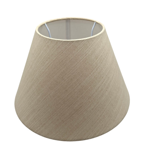Transform your space with this cream chintz lampshade. Its minimalist design adds a touch of elegance to any room.
