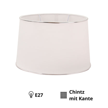 Deze elegante lampenkap in zilver en wit geeft een verfijnde uitstraling aan elk interieur.
