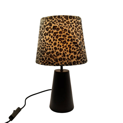 This detailed shot showcases the timeless black Leo table lamp. Perfectly blends elegance with functionality in any room.
